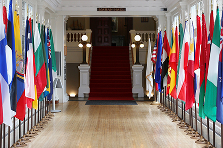 Hallway with flags. Link to Gifts of Appreciated Securities